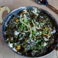 Chicken Saag · Tender chicken cooked with creamy spinach. NOT SERVED WITH RICE OR NAAN.