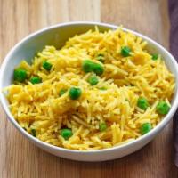 Mutter Pulao · Long-grain basmati rice cooked with green peas
