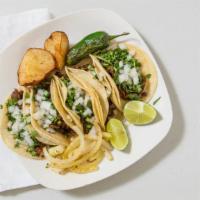 Tacos (5 Pieces) · Onions, cilantro, grilled onions, potatoes and jalapeño.