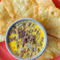 Chile Con Queso Joey · Delicious Queso with Ground beef or Sub Filet