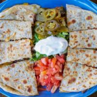 Fajita Quesadillas · Popular item. Grilled flour tortilla stuffed with melted cheddar and jack cheese. Choice of ...