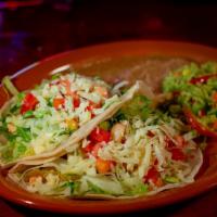 2 Soft Tacos · With Lettuce, Tomato, and Cheese (Served with Rice and Beans)