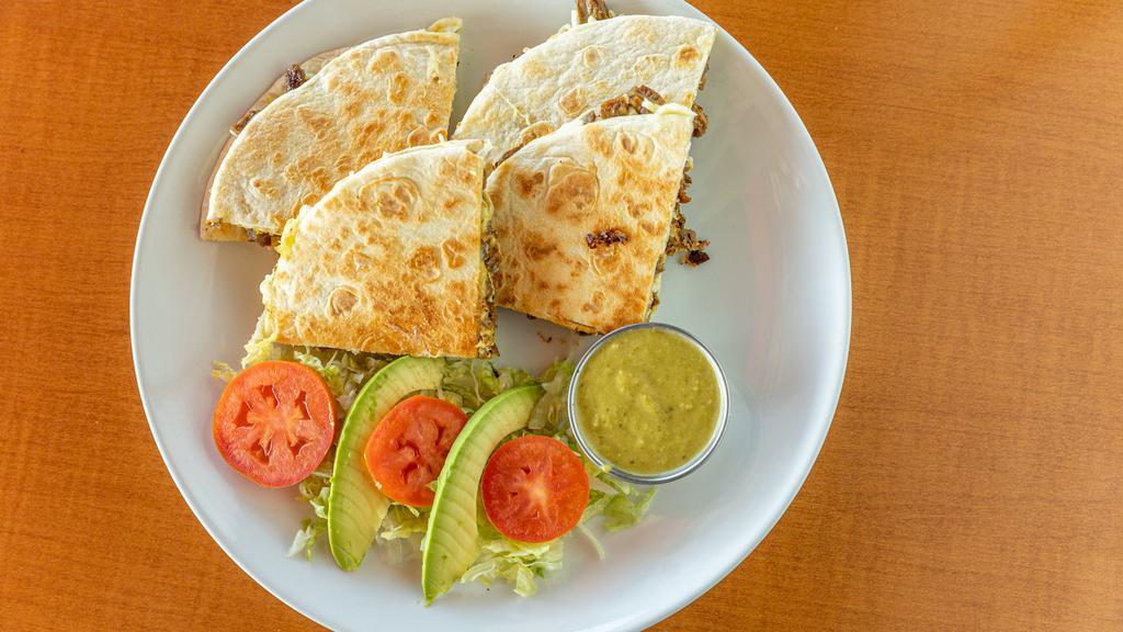 Quesadilla Harina · Flower Tortilla filled with cheese and your chose of meat served with a salad