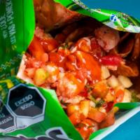 Tostiviche (Tostitos With Ceviche) · Our Tostiviche is Tostitos with Shrimp Ceviche. The Shrimp Ceviche is the same Ceviche from ...