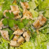 Caesar Salad · Grill chicken, Caesar dressing, romain lettuce, Romano cheese and croutons.