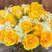 Soaking In Sunshine · This beautifully sunny arrangement is the perfect pick me up!
All sizes start with a hydrang...