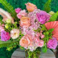 Spring Forward · This modern lush arrangement has the perfect spring color combo- peach and lavender!