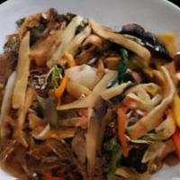 Vegetarian Japchae · Stir-fried sweet potato 
noodles with vegetables