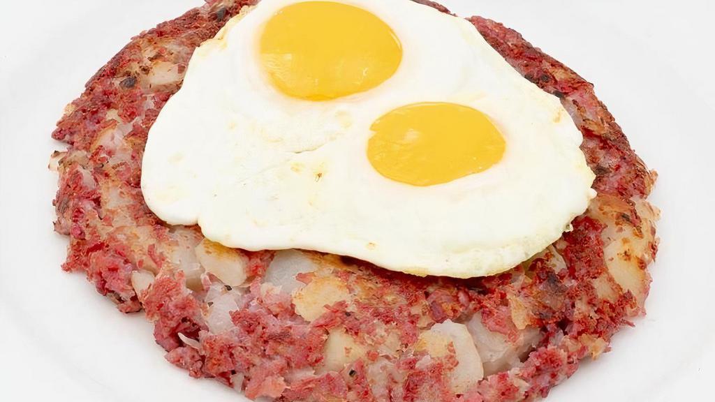 Corned Beef Hash And Eggs · 10 oz. Corned beef, potato, onion, and 2 over easy eggs. Served with choice of side