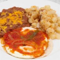 Huevos Rancheros · 2 eggs over medium, ranchero sauce, potatoes, and refried beans. Served with choice of side ...