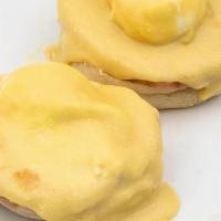 Classic Benedict · Toasted English muffin, Canadian bacon, two medium poached eggs, hollandaise sauce, and pota...