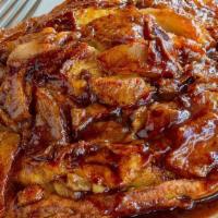 Apple Pancake · Oven baked with sauteed granny smith apples and pure Sinkiang cinnamon glaze.