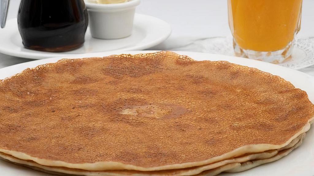 49Er Flap Jacks Pancake · Plate sized, thin, and tender.
