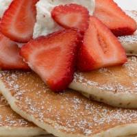 Strawberry Pancake · Served with whipped cream and strawberry syrup