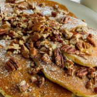 Pecan Pancake - 1/2 · Buttermilk batter filled and topped with roasted pecans and dusted with powdered sugar