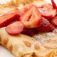 French Crepes · 3 crepes with fresh strawberries. Lightly dusted with powdered sugar.