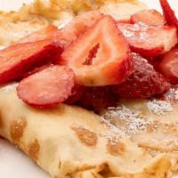 French Crepe · 1 crepe with fresh strawberries. Lightly dusted with powdered sugar.