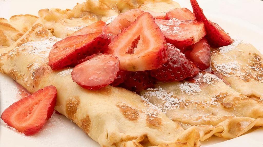 French Crepe · 1 crepe with fresh strawberries. Lightly dusted with powdered sugar.