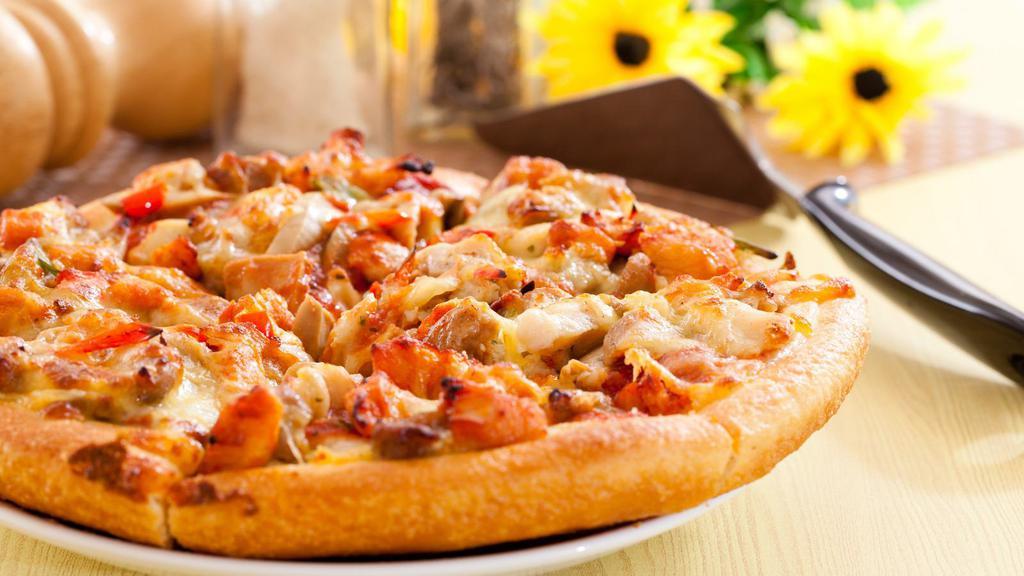 Bbq Chicken Pizza · Customer's favorite! Fresh BBQ sauce topped on chicken, peppers, and onions.