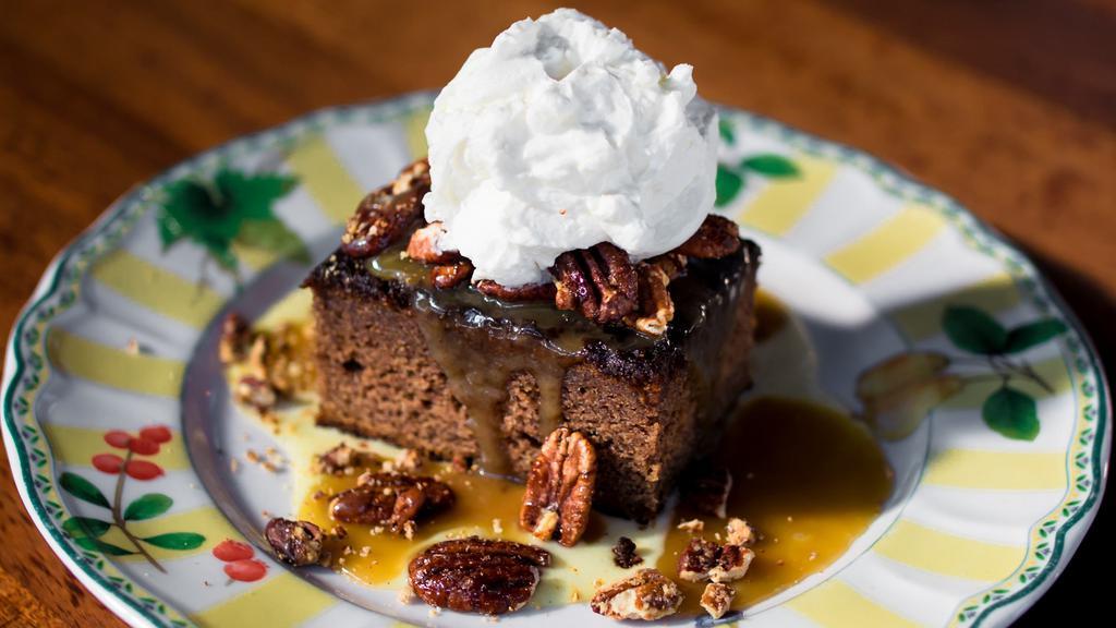 Whiskey Cake · sticky toffee cake, bourbon anglaise, spiced pecans, housemade vanilla whipped cream.