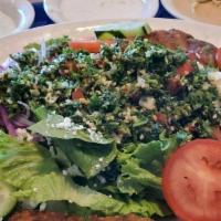 Make Own Falafel Salad · Fresh Falafel on top of fresh romaine and iceberg lettuce, tomatoes, cucumbers, feta cheese,...