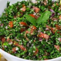 Tabouli · fresh parsley, cracked wheat, onions, and tomatoes tossed in olive oil and lemon juice