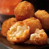 Steakhouse Mac & Cheese Bites · Eight golden bites filled with macaroni, Asiago, Mozzarella and Parmesan cheese. Served with...