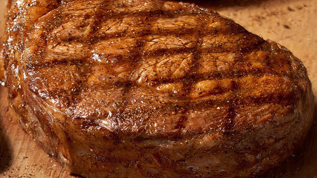 Ribeye · Well-marbled, juicy and savory. Grilled with the natural flavor of oak. Served with two freshly made sides.