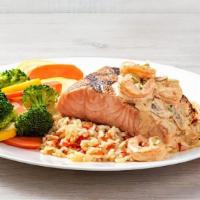 Toowoomba Salmon · Grilled Salmon topped with seasoned and sautéed shrimp tossed with mushrooms in a creamy cre...