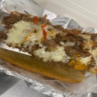 Capital City Cheesesteak · Fresh thinly sliced chopped beef covered in provolone cheese and our Capital City Gastro Sau...