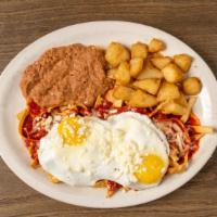Chilaquiles Mexicanos · Guajillo sauce. Add chicken for an additional charge.