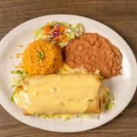 Chimichanga · Deep-fried burrito (beef or chicken) with cheese * gravy, cheese dip sauce on top - optional *
