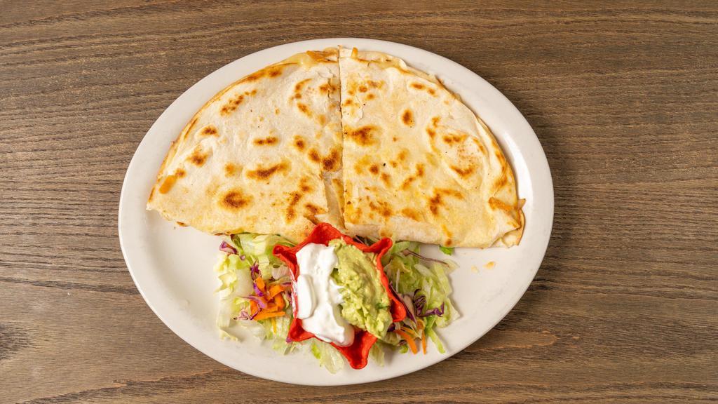 Quesadilla · 12-inch flour tortilla filled with cheese served with guacamole & sour cream.