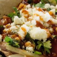 The Temple Of Pork · Corn tortilla, pulled pork, bacon, grilled onions, queso fresco, cilantro, sweet and spicey ...