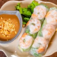 Spring Rolls (2) · Steamed pork and shrimp in rice paper and fresh veggies.
