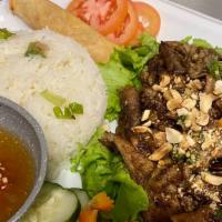 Grilled Pork Rice - Com Thit Nuong · Grilled pork with jasmine rice with egg roll.