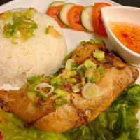 Crispy Chicken Rice - Com Ga Xoi Mo · Crispy chicken leg quarter with jasmine rice.