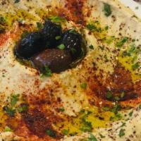Hummus & Pita · Pureed garbanzo beans and tahini with spices and oil