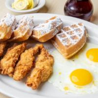 Chicken And Waffles · Includes two eggs any style.