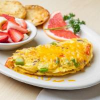 Tex-Mex Omelette · Made with ground beef, onion, bell pepper, tomato and cheddar cheese.