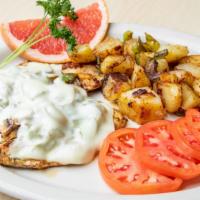 Nena'S Grilled Chicken · Our grilled chicken breast topped with grilled vegetables and swiss cheese.
