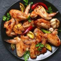 Spicy Lemon Pepper Chicken Wings · Mouthwatering Chicken wings, tossed in a Spicy Lemon Pepper sauce and fried to perfection. S...