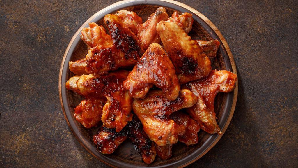 Bbq Chicken Wings · Mouthwatering Chicken wings, tossed in a BBQ sauce and fried to perfection. Served in Customer's choice of quantity.