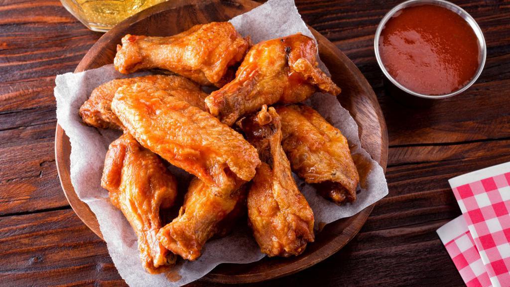 Buffalo Medium Chicken Wings · Mouthwatering Chicken wings, tossed in a Medium Buffalo sauce and fried to perfection. Served in Customer's choice of quantity.