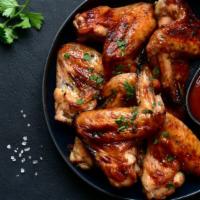 Seasoned Chicken Wings · Mouthwatering Chicken wings, tossed in House special seasoning and fried to perfection. Serv...