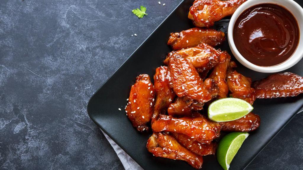 20 Chicken Wings, 2 Sides, & 2 Drinks · 20 Pieces of Mouthwatering Chicken Wings, fried to perfection. Served with customer's choice of 2 sides and 2 drinks.