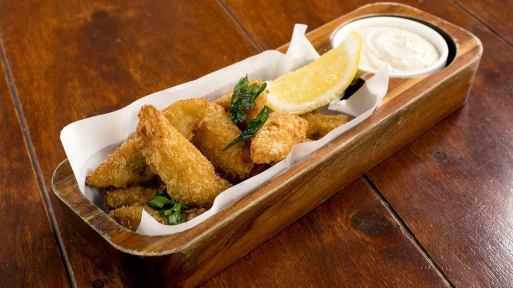 Lemon Pepper Chicken Tenders · Mouthwatering Chicken Tenders, tossed in Lemon Pepper sauce, and fried to perfection. Served in Customer's choice of dipping sauce and quantity, with a butter Toast included on the side.