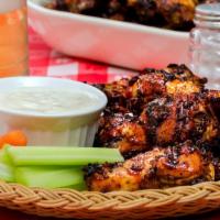 Bbq Chicken Tenders · Mouthwatering Chicken Tenders, tossed in BBQ sauce, and fried to perfection. Served in Custo...