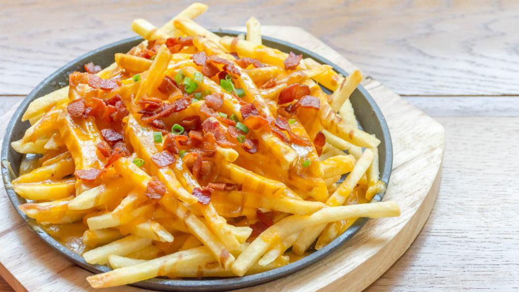 Bacon Cheese Fries · Delicious French fries deep fried 'till golden brown, and topped with crispy bacon and melted cheese.
