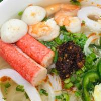 Spicy Seafood Phở · Spicy broth with shrimps, squids, crab sticks, fish balls and delicate rice noodles, it will...